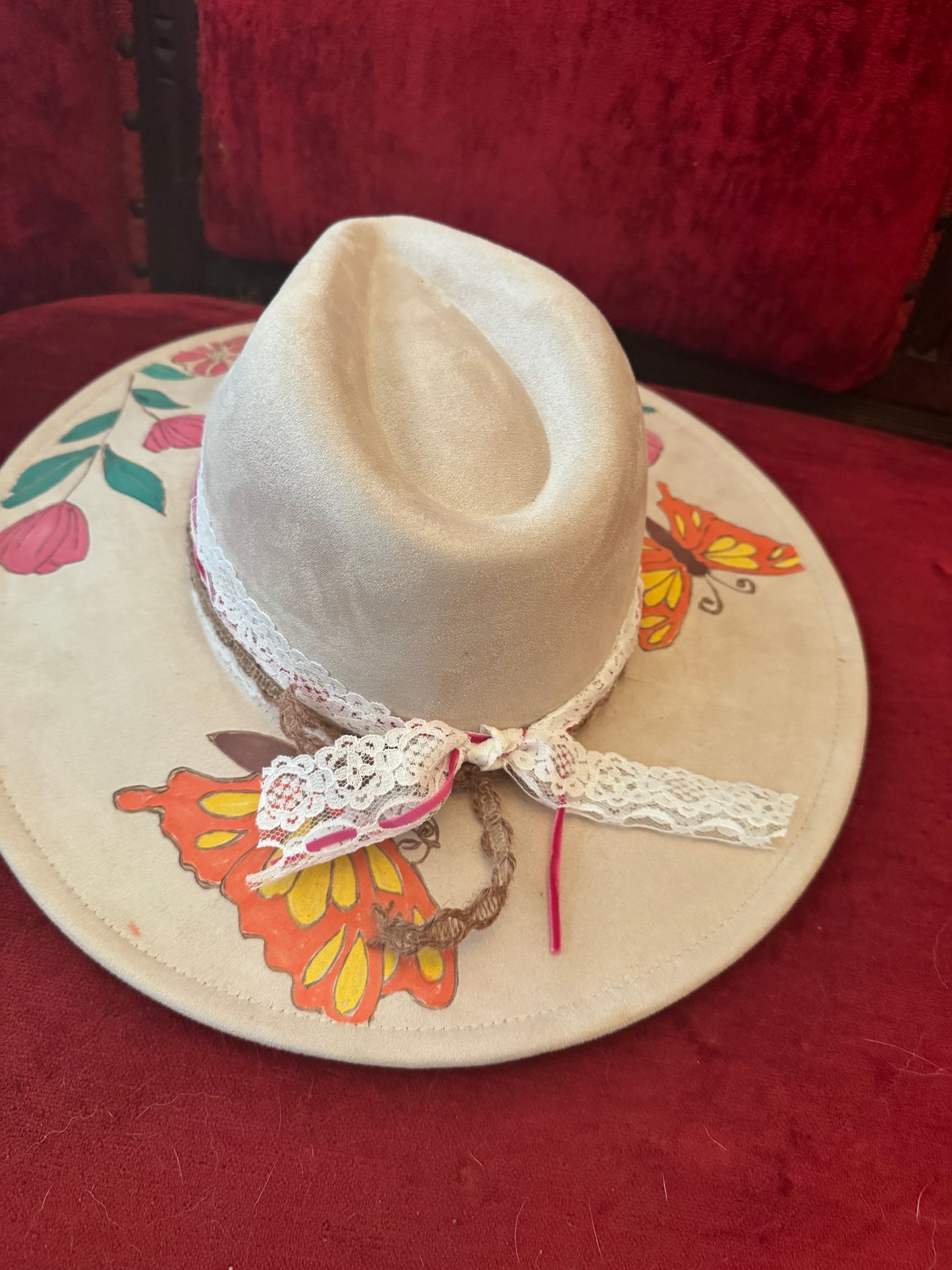 Hand painted hat with butterfly details